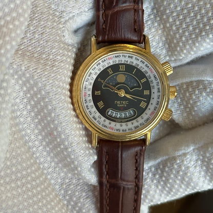 Reloj NETEC de mujer con calendario circular y motivo lunar Año 1990 - imagen 10