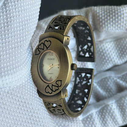 Reloj Studio Time de mujer con corazones y brazalete calado Año 2004 - imagen 2