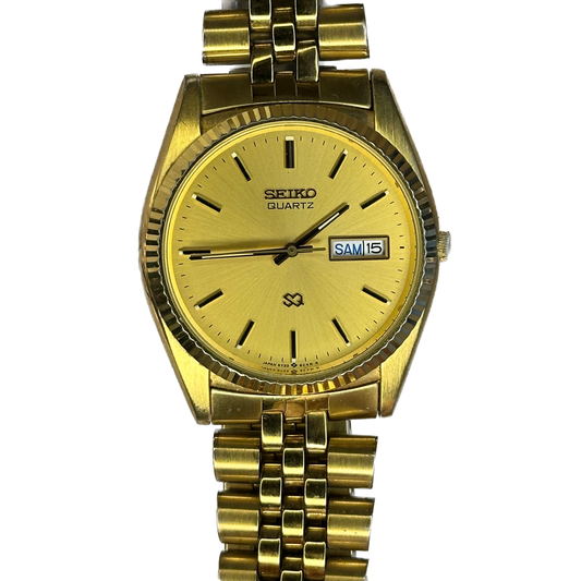 Reloj Seiko Quartz Años 90´s Hombre SQ 5Y23A  dorado calendario inglés-francés IMPECABLE