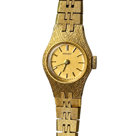 Reloj SEIKO 1100-1469 Mujer A Cuerda Dorado Texturado Brazalete Geométrico Mayo1970 — portada