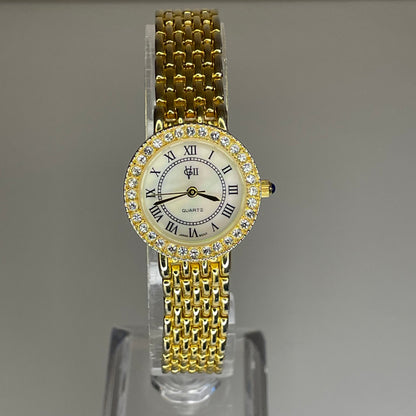 Reloj Joya Gloria Vanderbilt GV II Año 1995 aprox. NOS Dorado Bisel de cristales Neoclásico