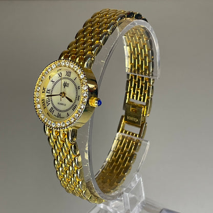 Reloj Joya Gloria Vanderbilt GV II Año 1995 aprox. NOS Dorado Bisel de cristales Neoclásico