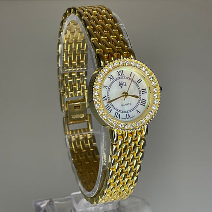 Reloj Joya Gloria Vanderbilt GV II Año 1995 aprox. NOS Dorado Bisel de cristales Neoclásico