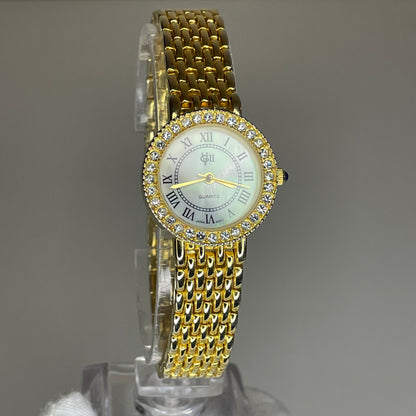 Reloj Joya Gloria Vanderbilt GV II Año 1995 aprox. NOS Dorado Bisel de cristales Neoclásico
