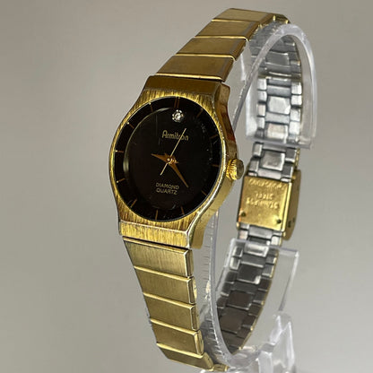 Reloj joya Armitron Diamond Quartz Año 1990 aprox. Dial negro y pulsera original