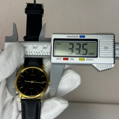 Reloj Pulsar by SEIKO Quartz Black Dial Marzo de 1995 – 33 mm Dorado