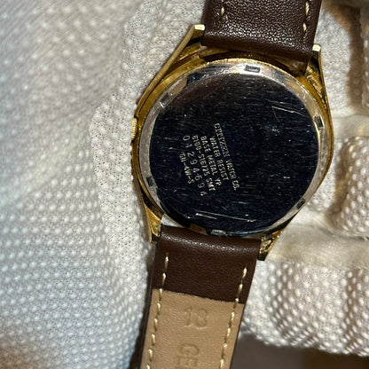Reloj Citizen Quartz Day-Date Hombre 1980 Octagonal Champagne/Dorado Texturizado