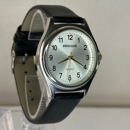 Reloj Brigade Hombre Elab. en 1999 Dial gris sunburst / Agujas doradas / Correa Nueva