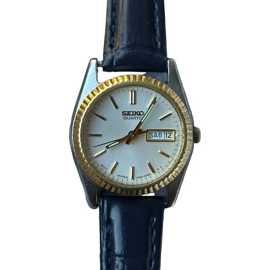 Seiko Quartz Mujer Bisel estriado dorado y calendario Día-Fecha Año 1995 Impecable