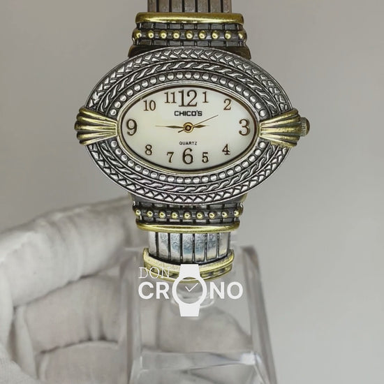 Reloj Joya Chico’s ovalado bicolor / brazalete ornamental Año 2005 Estética Bohemia y Western