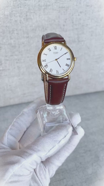 Reloj Citizen Quartz Hombre Marzo de 1990 Romano Clásico Dial Blanco