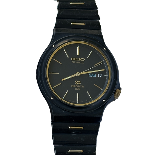 Seiko Hombre SQ Sports 100 6923-7069 Negro Dorado Marzo 1985
