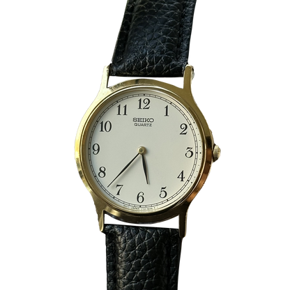 Seiko Hombre V700-8A10 Perfil Delgado Julio 1999 Minimalista Clásico