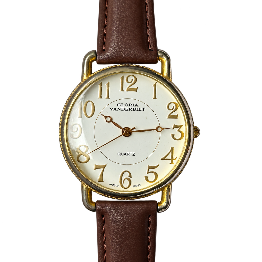 Reloj Gloria Vanderbilt Mujer Grande Números Dorados y Estética de Relojería Clásica Año 1996 — portada transparente