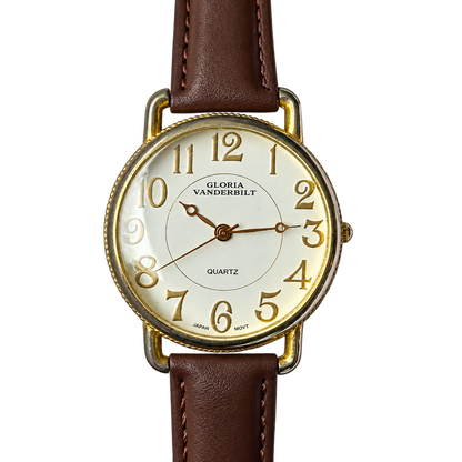 Reloj Gloria Vanderbilt Mujer Grande Números Dorados y Estética de Relojería Clásica Año 1996 — portada transparente