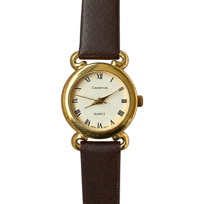 Reloj Cadence de Mujer Dorado con Números Romanos y Asas Decorativas Año 1992