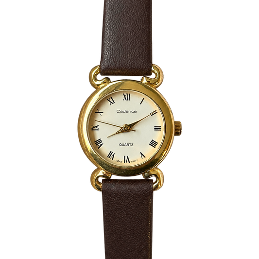 Reloj Cadence de Mujer Dorado con Números Romanos y Asas Decorativas Año 1992