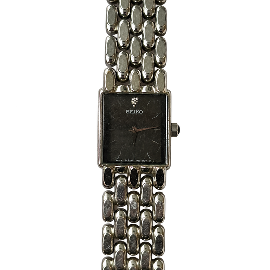 Reloj Joya Seiko 1F20-0AH0 Mujer Corona Negra Junio de 1992 Estética de Geometría Sobria