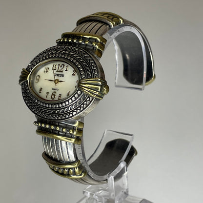 Reloj Joya Chico’s ovalado bicolor / brazalete ornamental Año 2005 Estética Bohemia y Western